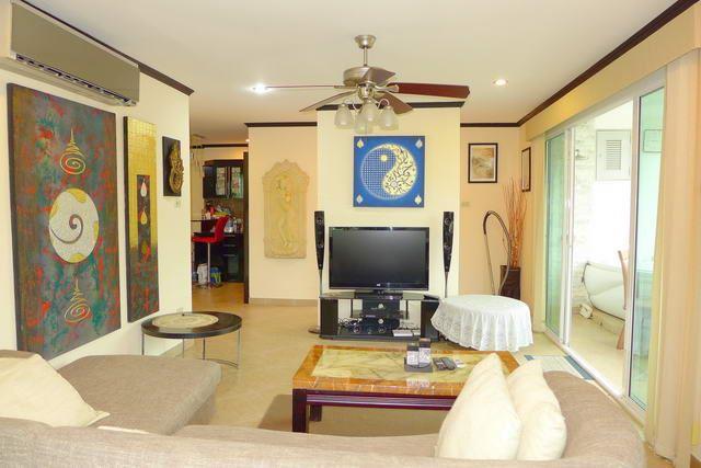 Condominium For Sale Naklua showing the living area and balcony Condominium For Sale Naklua showing the living area and balcony