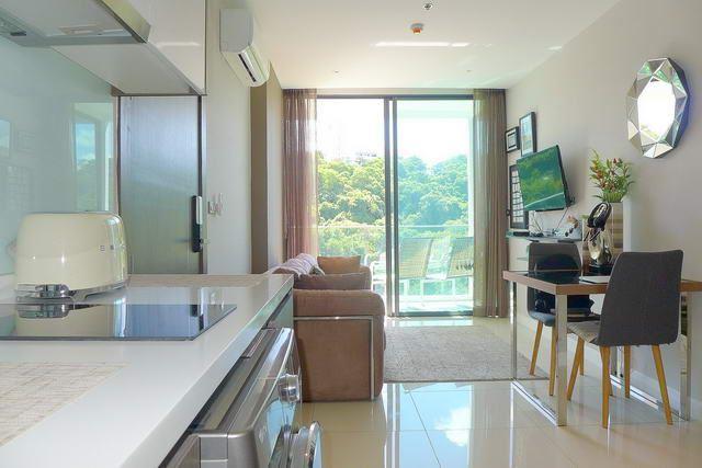 Condominium for sale Pratumnak Hill Pattaya showing the living and dining areas Condominium for sale Pratumnak Hill Pattaya showing the living and dining areas