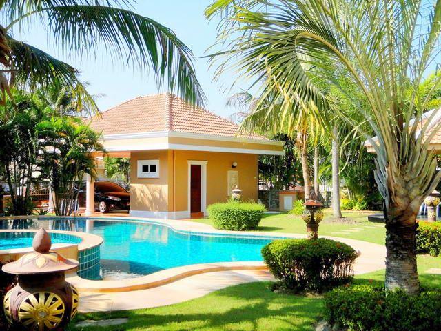 House for sale East Pattaya showing the garden and swimming pool House for sale East Pattaya showing the garden and swimming pool