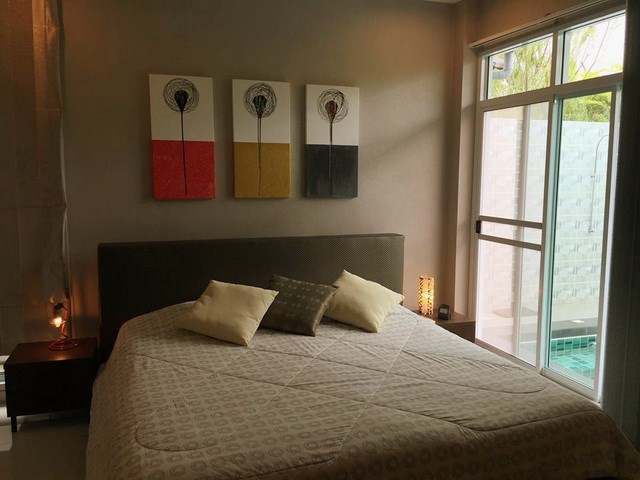 House for Sale Huay Yai Pattaya showing the master bedroom poolside House for Sale Huay Yai Pattaya showing the master bedroom poolside