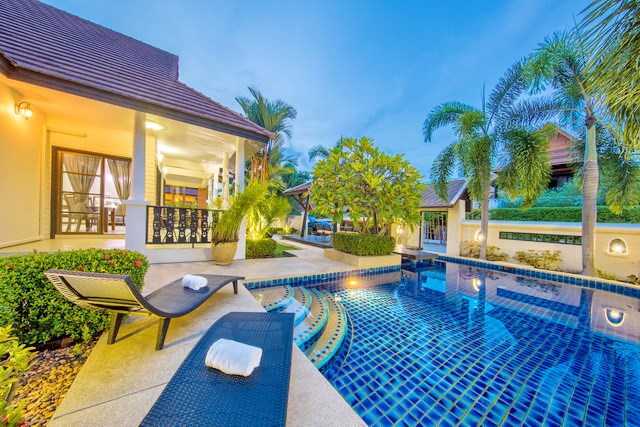 House for sale Jomtien Pattaya showing the house, pool and terraces House for sale Jomtien Pattaya showing the house, pool and terraces
