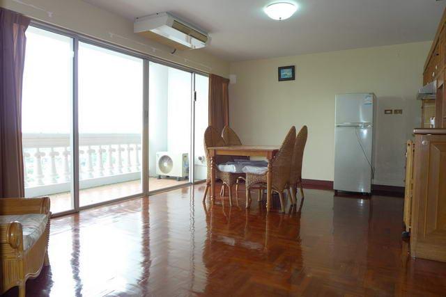 Condominium for sale in Naklua showing the dining area and balcony Condominium for sale in Naklua showing the dining area and balcony