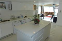 Condominium for sale Naklua showing the island-style kitchen