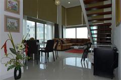 Condominium for sale Naklua showing the dining and living areas