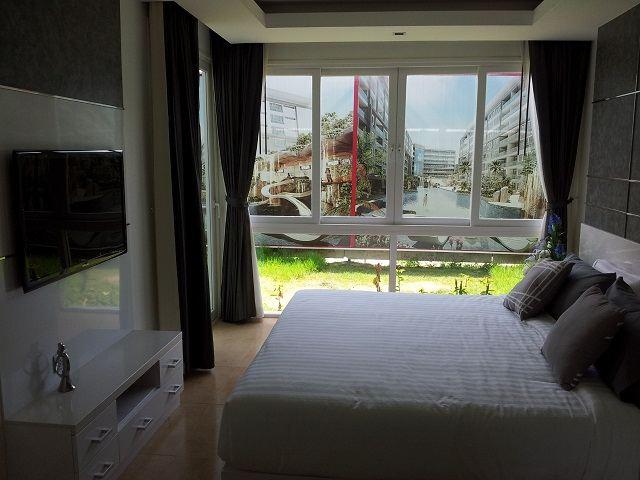 Condominium For Sale Pattaya showing the bedroom area