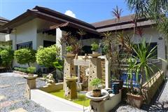 House For Sale Bangsaray showing the house garden and pool