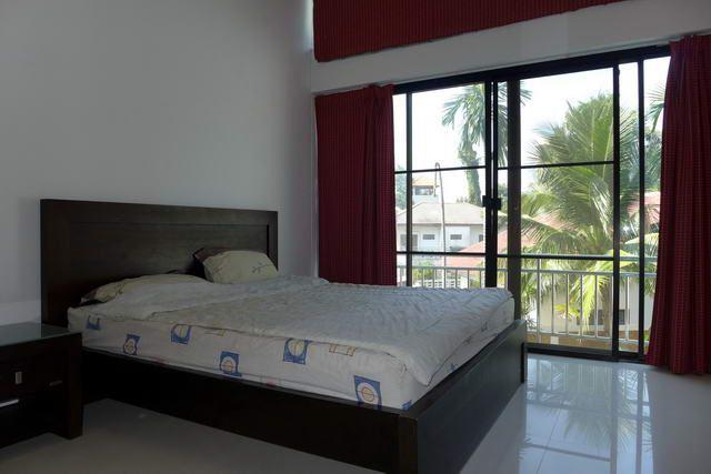 Holiday Pool Villa Rental Business for Sale Pattaya showing a bedroom and balcony