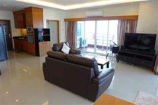 Condominium for sale in Jomtien showing the living area and kitchen