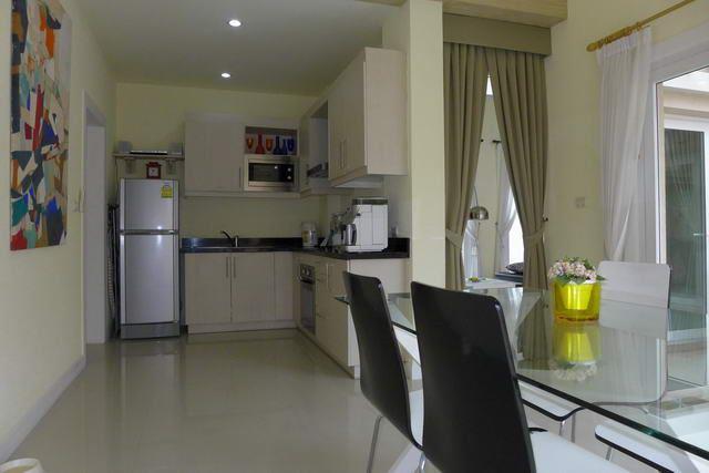 House for sale Pattaya showing the dining and kitchen areas House for sale Pattaya showing the dining and kitchen areas