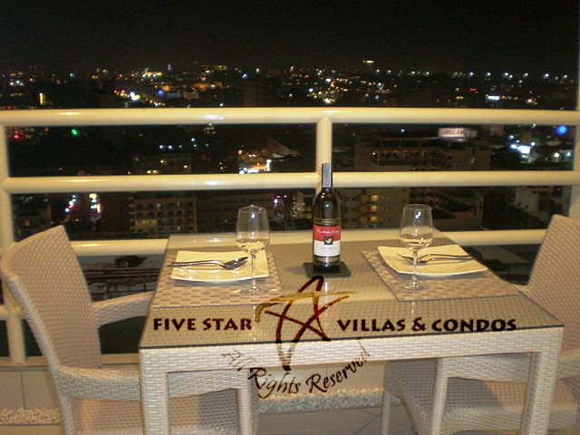 Condominium for rent on Pattaya Beach at VT 6 showing the balcony at night