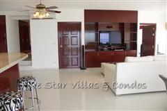 Condominium for rent on Pattaya Beach at VT 6 showing sitting area and TV