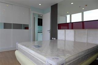 Condominium for sale on Pratumnak The Vision RESALE showing the bedroom and built-in furniture