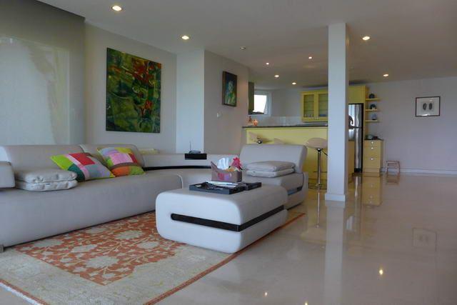 Condominium For Sale Naklua showing the living area and kitchen 