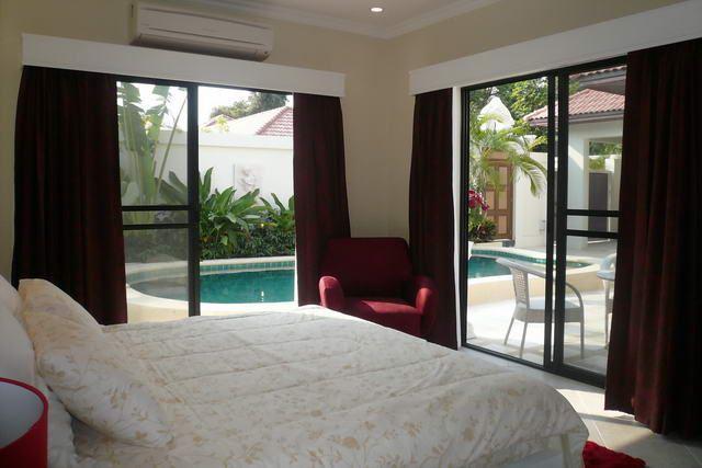 House for sale on Pratumnak showing the poolside master bedroom