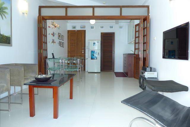 Condominium for sale in Naklua Wong Amat showing the living and dining areas Condominium for sale in Naklua Wong Amat showing the living and dining areas