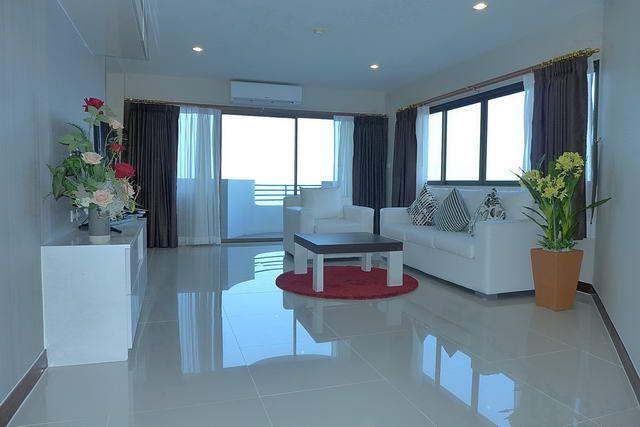 Condominium for sale at Ban Amphur Pattaya showing the living area and balcony 
