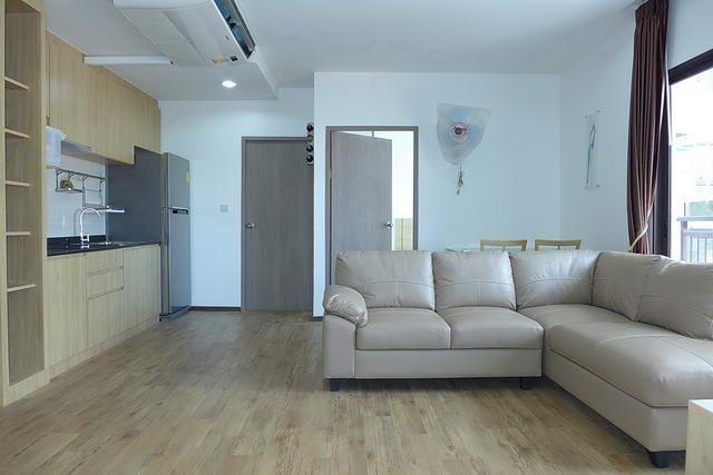 Condominium For Sale Pattaya showing the kitchen and living area