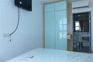 Condominium For Sale Pattaya showing the bedroom suite 