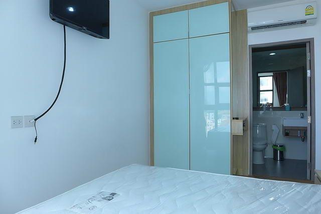 Condominium For Sale Pattaya showing the bedroom suite Condominium For Sale Pattaya showing the bedroom suite