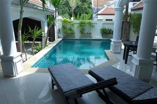 House for sale Na Jomtien showing the  the terraces and swimming pool