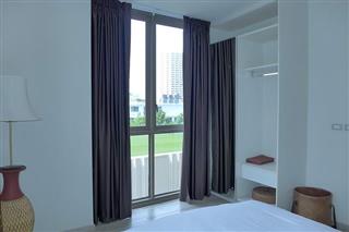 Condominium For Sale Wongamat showing the bedroom and view