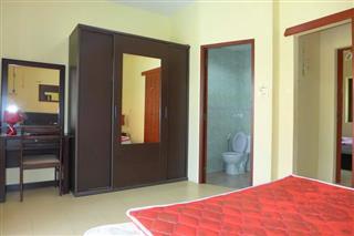 Pool resort and villa business for sale Pratumnak Pattaya showing the master bedroom suite
