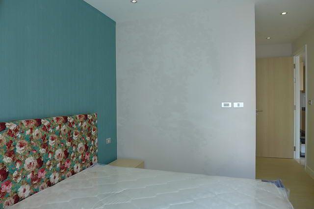 Condominium for sale Pattaya showing the bedroom suite