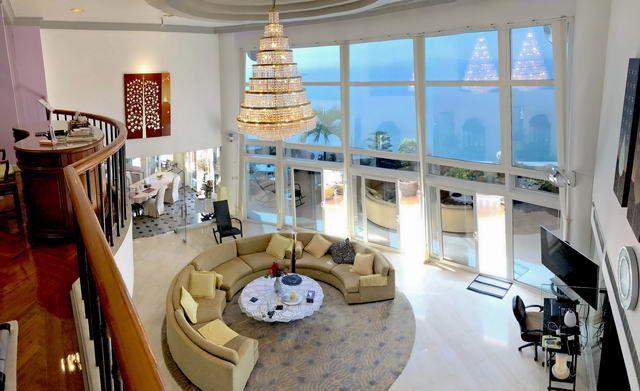 condominium for sale Wong Amat Pattaya showing the living and huge out side patio condominium for sale Wong Amat Pattaya showing the living and huge out side patio
