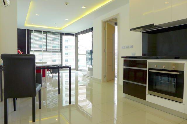 Condominium for sale WongAmat Pattaya showing the dining and kitchen areas 
