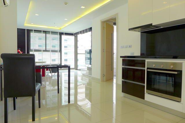 Condominium for sale WongAmat Pattaya showing the dining and kitchen areas Condominium for sale WongAmat Pattaya showing the dining and kitchen areas