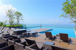 Condominium for sale WongAmat Pattaya showing the roof top swimming pool 