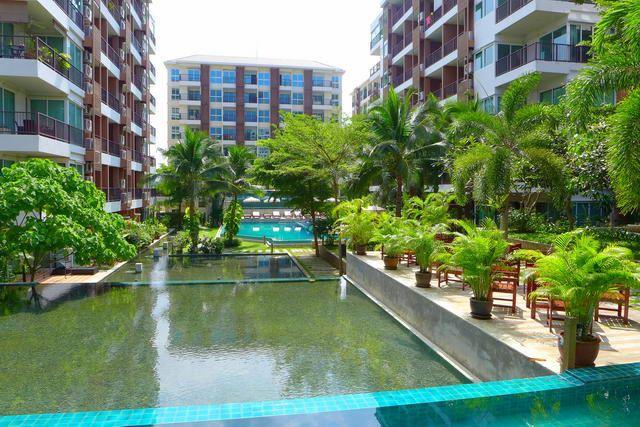 Condominium For Sale South Pattaya showing the communal pool and buildings Condominium For Sale South Pattaya showing the communal pool and buildings