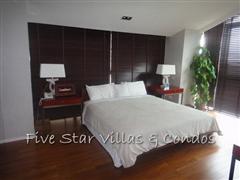 Condominium for sale on Pattaya Beach at Northshore showing a master bedroom