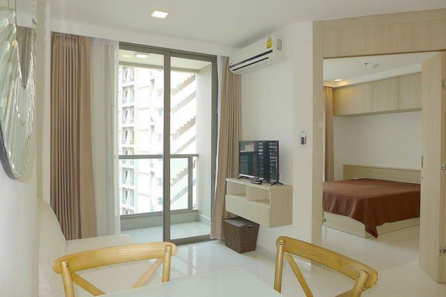 Condominium for sale Pratumnak Hill Pattaya showing the living and balcony area Condominium for sale Pratumnak Hill Pattaya showing the living and balcony area