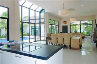 house for sale east pattaya showing the kitchen and dining areas  