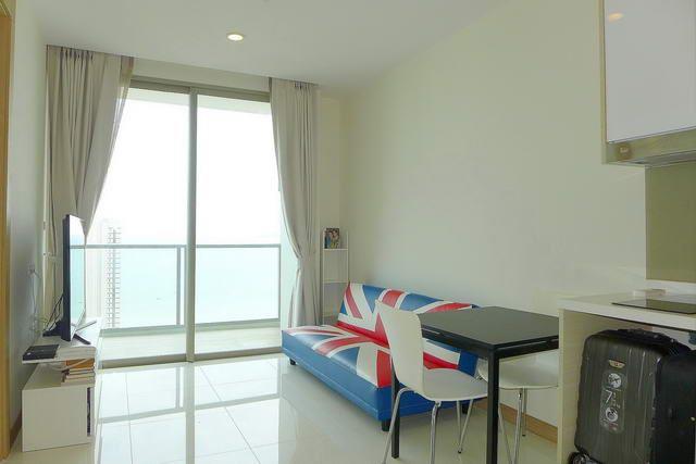 Condominium for sale Wong Amat Pattaya showing the living and dining areas