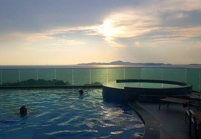 Condominium for sale Pratumnak Hill showing the communal pool at night Condominium for sale Pratumnak Hill showing the communal pool at night