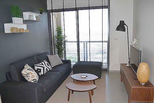 Condominium for sale South Pattaya showing the living room and balcony Condominium for sale South Pattaya showing the living room and balcony