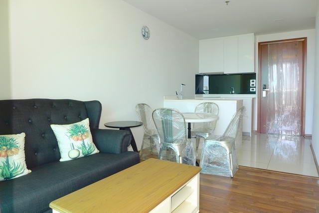 Condominium for sale Pratumnak Hill showing the living and dining areas Condominium for sale Pratumnak Hill showing the living and dining areas