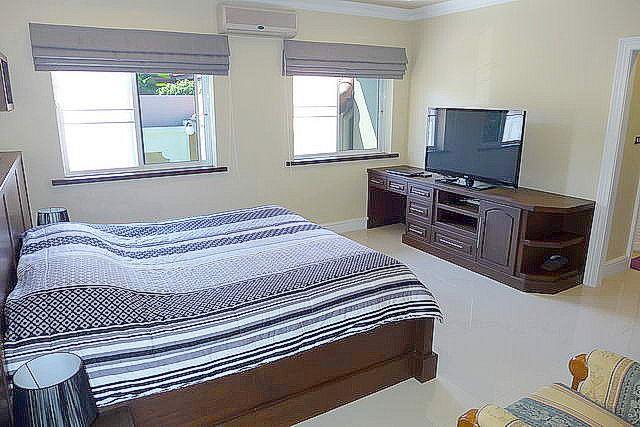 House for Sale Nongpalai Pattaya showing the master bedroom suite
