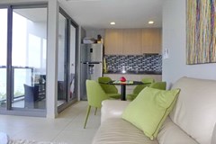 Condominium for rent Pattaya Unixx showing the dining and kitchen areas 