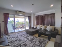 Condominium for rent Pattaya showing the living area and balcony 