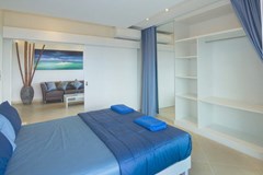 Condominium For Rent Pratumnak Pattaya showing a bedroom suite