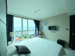 Condominium for rent on Pratumnak Hill showing the master bedroom and sea view 