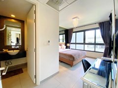 Condominium for rent Wongamat Pattaya showing the bedroom suite 