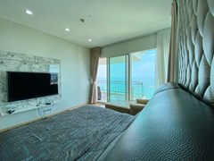 Condominium for sale Jomtien showing the master bedroom and balcony 