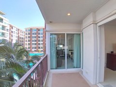Condominium for sale Pattaya showing the balcony and pool view 