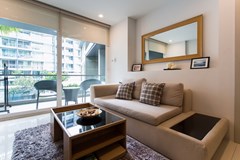 Condominium for sale Pattaya showing the living area and balcony