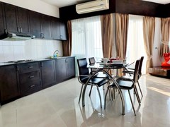 Condominium for sale Wong Amat Pattaya showing the dining and kitchen 
