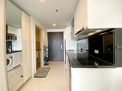 Condominium for sale Wong Amat Pattaya showing the kitchen and bathroom 